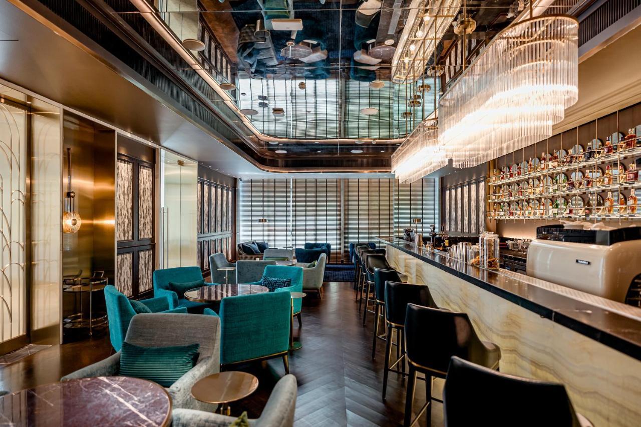 Silq Hotel & Residence, Managed By The Ascott Limited 曼谷 外观 照片 The bar at the 100 Queen's Gate